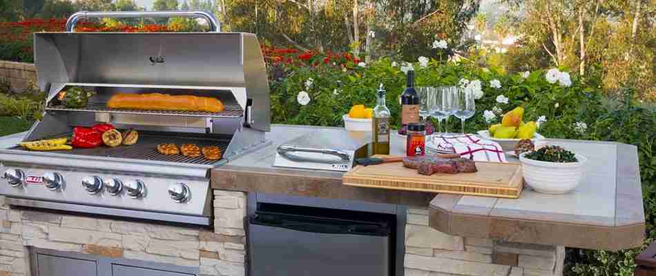 Outdoor kitchen with a grill in Tampa, FL.